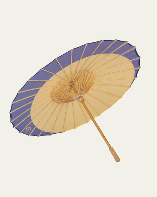 Detalle del tejido con protección solar UPF de la sombrilla Órbita Duna